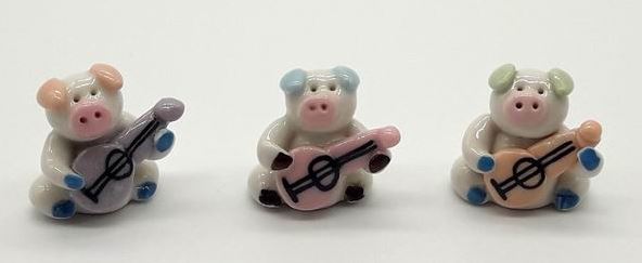 Porz. Schwein mit Gitarre