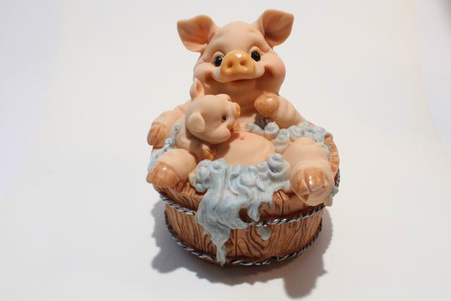Spark.Schweine im Holztrog,