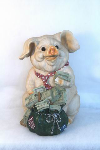 Gigantisches Sparschwein mit Geld dekoriert