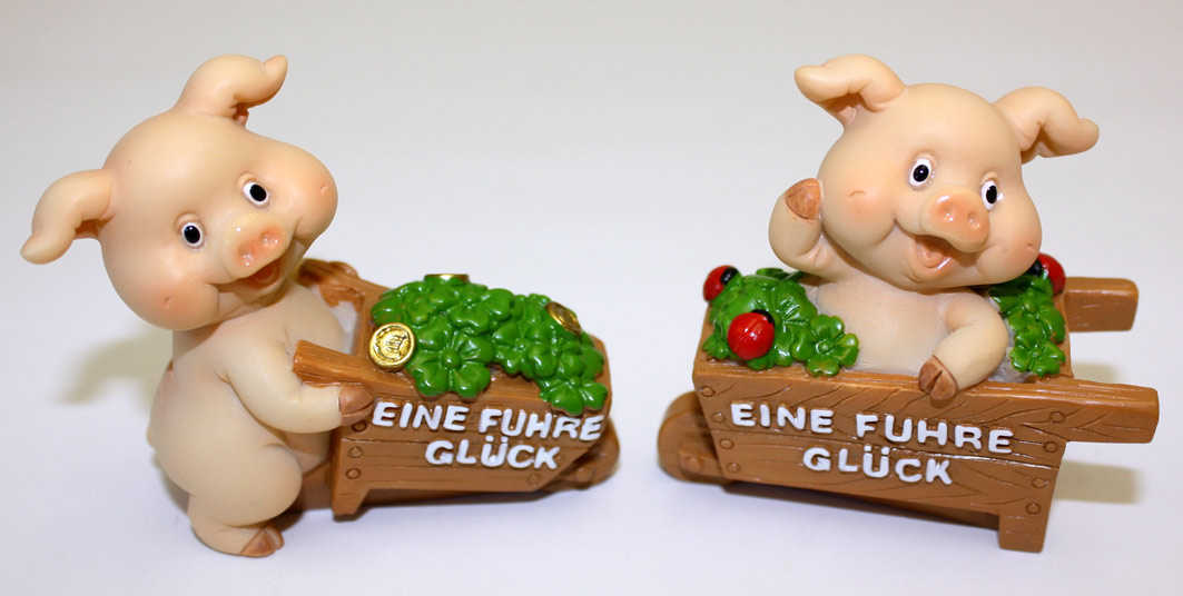 Schweine mit einer Fuhre Glück