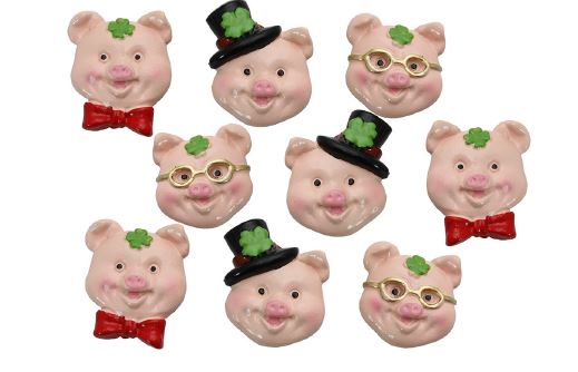 Schweinekopf mit Glücksmotiven